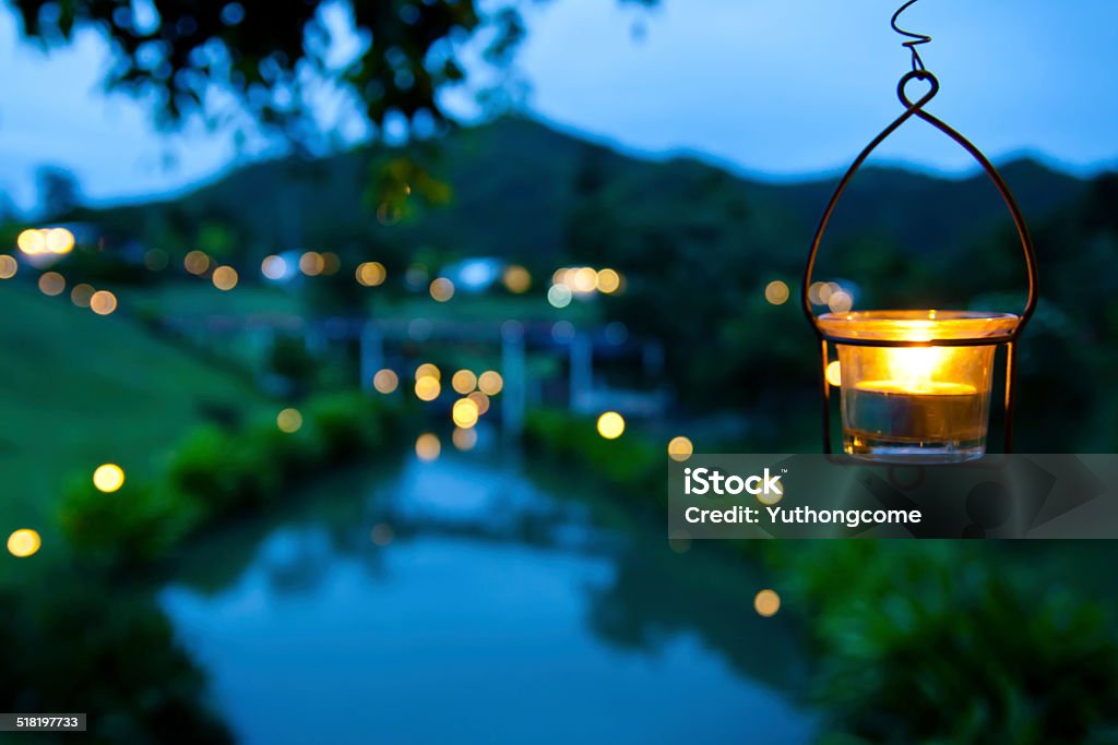 Lantern Lamp with mountains in the background. Animal Back Stock Photo