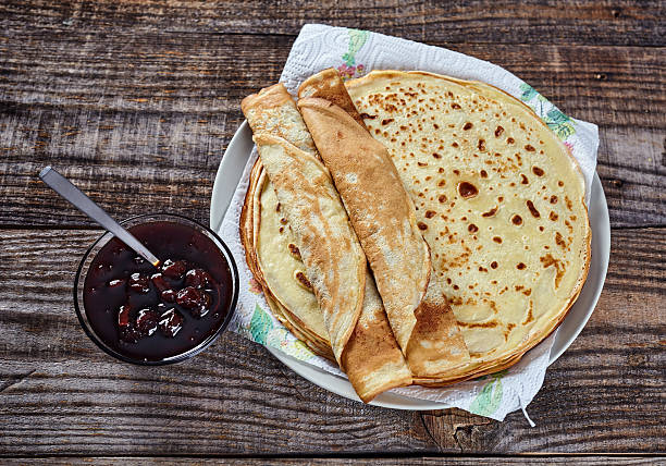 istock Pancakes filled with dark cherry jam 518198630