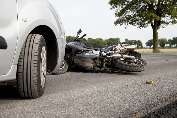 Motorbike Accident Motorbike Accident on the road with a car misfortune photos stock pictures, royalty-free photos & images