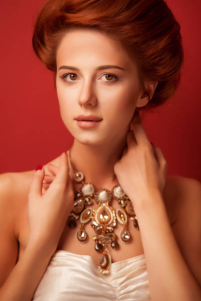 istock edwardian women with necklace 518200883