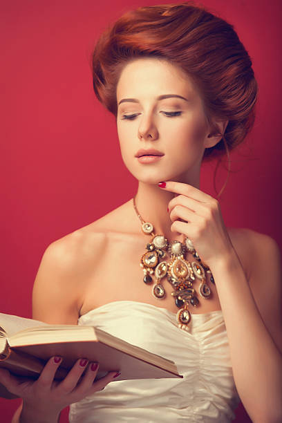 istock edwardian women with necklace and book 518200923
