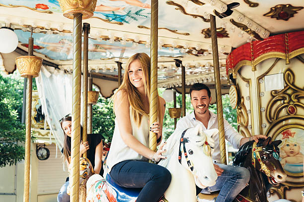 istock Happy Friends Playing On Merry-Go-Round 518200940