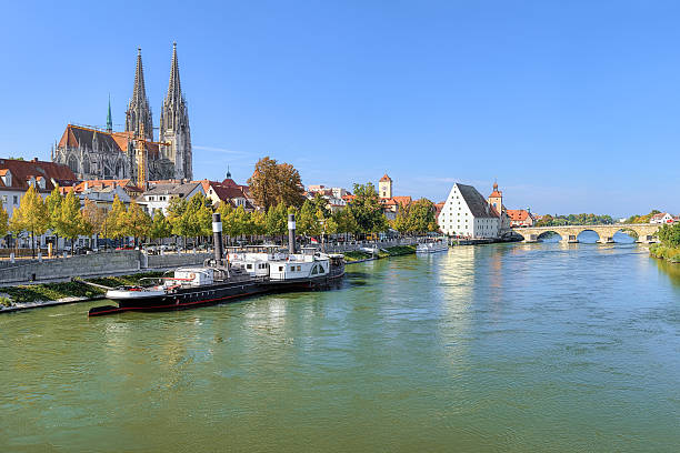 istock View on Danube river with Regensburg Cathedral, Germany 518201762