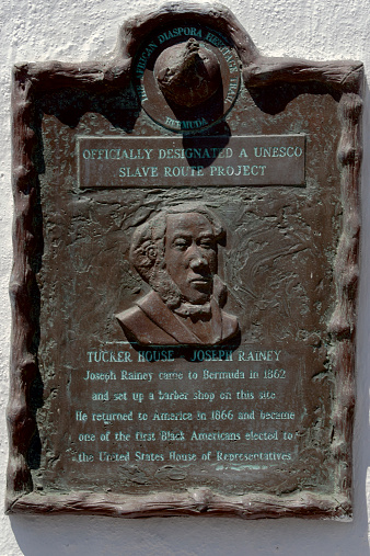 Joseph Rainey, former resident of Bermuda, was the first African-American member of the US House of Representatives (1866). This plaque is part of the UNESCO Slave Route Project, and is erected on the wall of the barber shop in Bermuda he once owned.