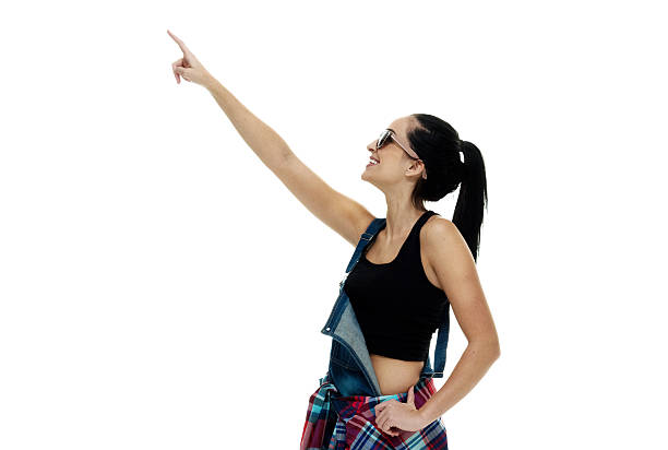 istock Smiling female pointing up 518203282