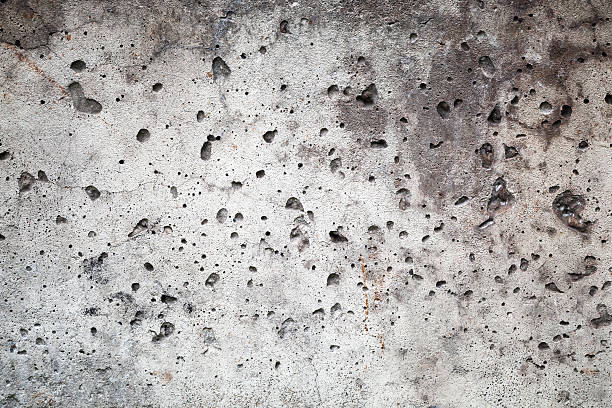istock Dark gray old concrete wall with stucco. Background texture 518204207