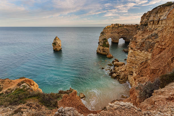istock Arch Beach Marinha, Portugal. 518204630