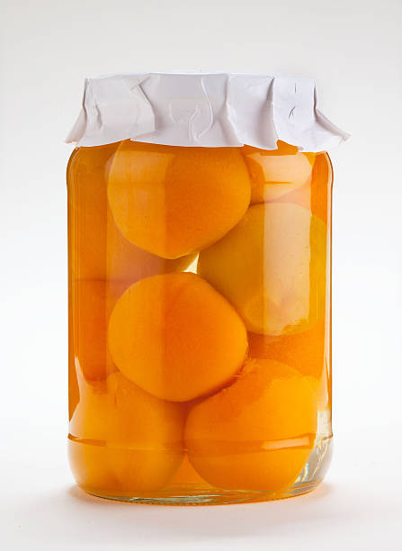 istock Peaches in a jar. Homemade preserves 518208110