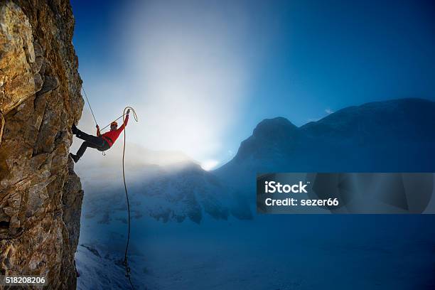 Extreme Winter Climbing Stock Photo - Download Image Now - Climbing, Mountain Climbing, Rock Climbing