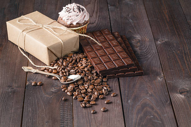 istock Chocolate and Coffee background on dark table 518208278