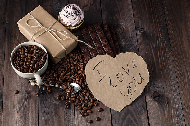 istock Love message on table with roasted coffee beans 518208844