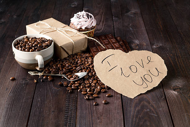 istock Love message on table with roasted coffee beans 518208922