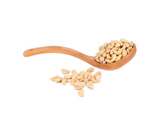 istock Cashew nuts in wooden spoon. 518211206