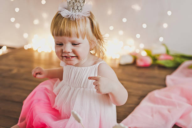 istock The child celebrates first birthday 518211316