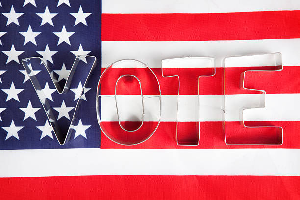 istock Word VOTE On American Flag 518211886