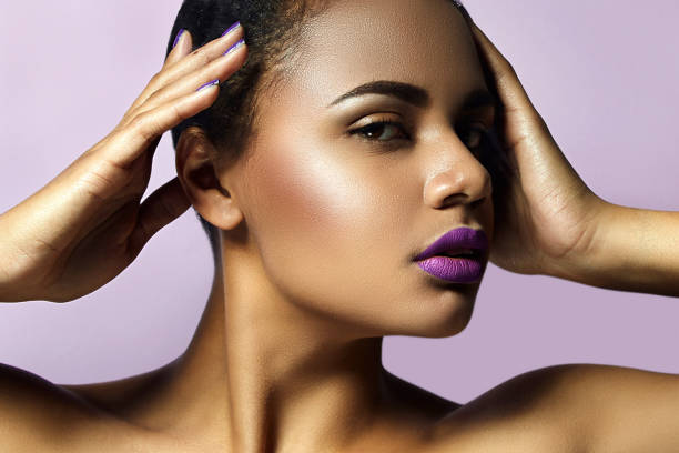istock Woman with purple lipstick. 518219466