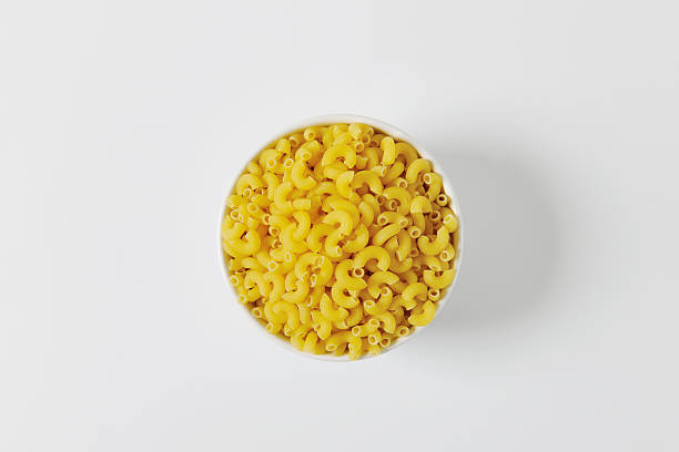 istock Bowl of dried macaroni 518220792