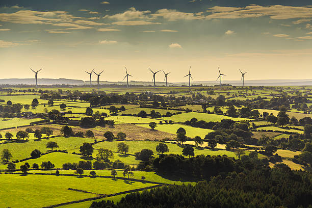 Wind turbines viewed from helicopter Wind turbines and farmland near Leeds, West Yorkshire. Aerial view from a helicopter  yorkshire england photos stock pictures, royalty-free photos & images