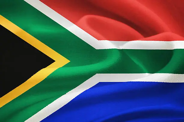 flag of the Republic of South Africa waving in the wind. Silk texture pattern