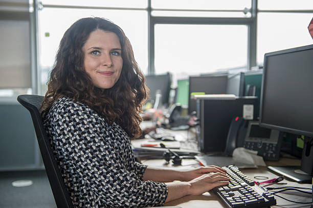 istock Young professional female in office 518222394
