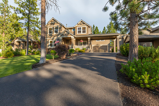Front elevation and driveway of a beautiful home.