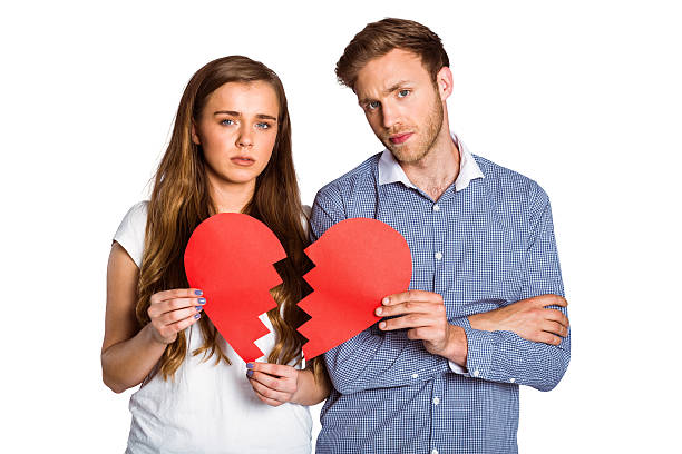 istock Couple holding broken heart 518223567