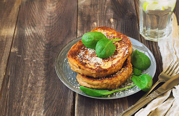 istock Savory french toasts with parmesan cheese and spinach 518223608