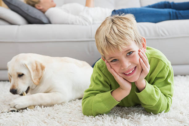 istock Cute little boy with his puppy 518224045