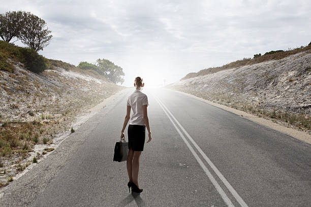 istock Businesswoman on road 518224231