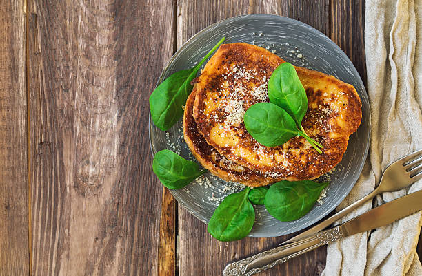 istock Savory french toasts with parmesan cheese and spinach 518224304