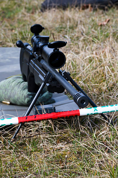 istock Military sniper aims at a target 518224344