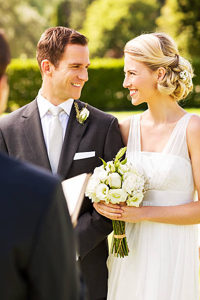 istock Couple Looking At Each Other During Ceremony 518226727