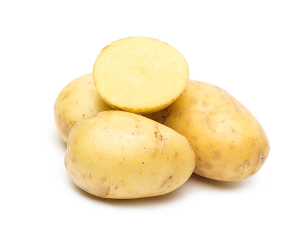 istock potato isolated on white background close up 518227431