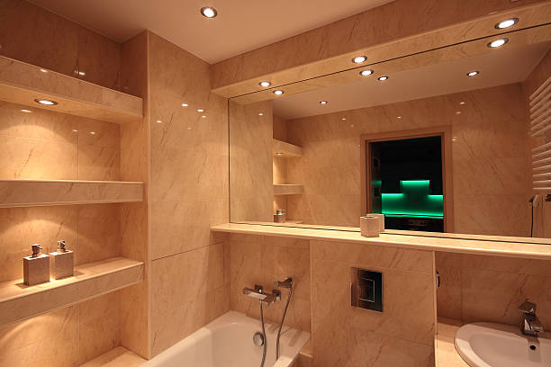interior kamar mandi rumah modern - bathroom lightning potret stok, foto, & gambar bebas royalti