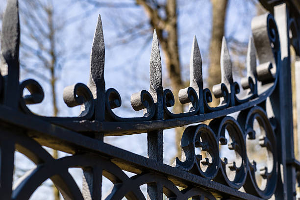 istock Image of a decorative cast iron fence. 518227944
