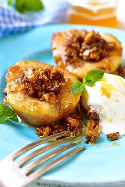 istock Grilled pear with caramelized walnuts and honey. 518231804