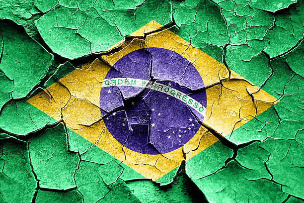 istock Grunge Brasil flag with some cracks and vintage look 518232384