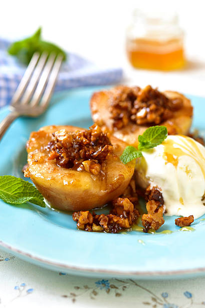 istock Grilled pear with caramelized walnuts and honey. 518232456