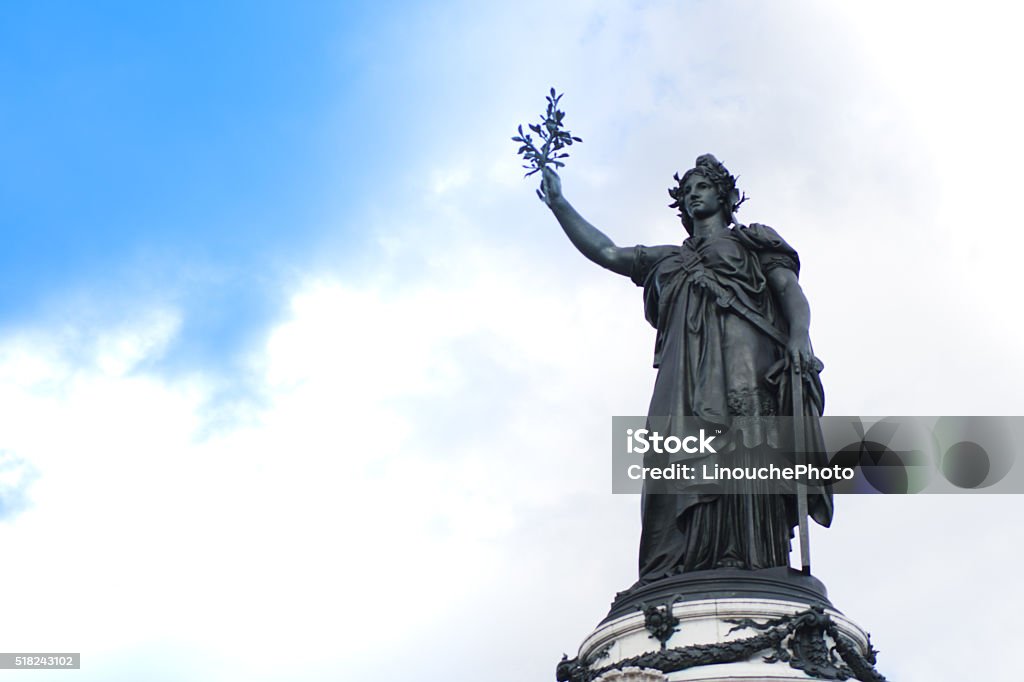 French statue of Liberty in Place de la Republique French statue of Liberty in Place de la Republique with blue sky and clouds Marianne - Symbol of France Stock Photo