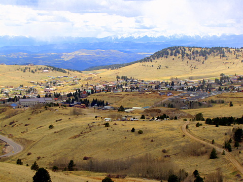 Sky view of an old western town, Cripple Creek Colorado.  This town is famous for gold mining and gambling.  The continental divide is in the background.