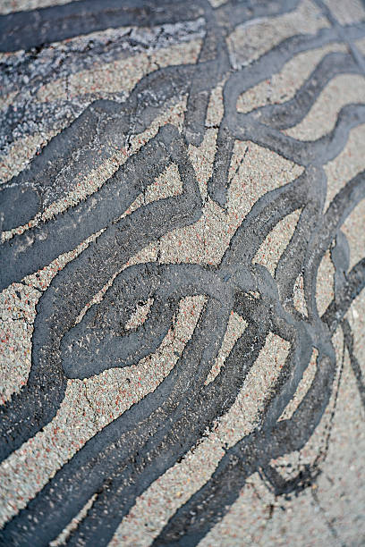 istock Abstract background: the asphalt road's surface with repare's lines 518243846