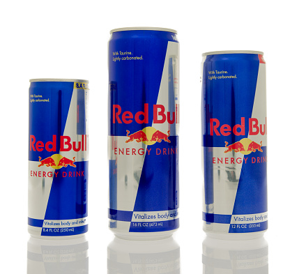 Winneconne, WI, USA - 14 March 2016: Three different sizes of Red Bull energy drink.