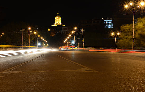 istock City lights and Tsminda Sameba Cathedral in Tbilisi, Georgia 518246008