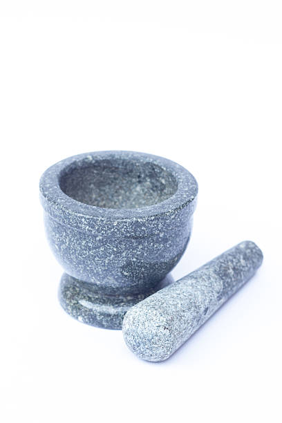 istock Stone mortar and pestle on white background 518246702