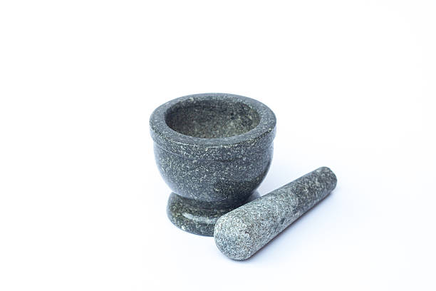 istock Stone mortar and pestle on white background 518246712