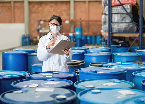 istock Woman working at a chemical plant 518247356