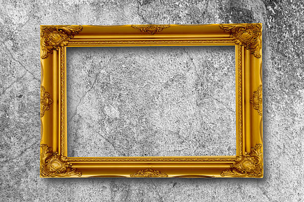 istock Old gold picture frame on grunge wall. 518247796