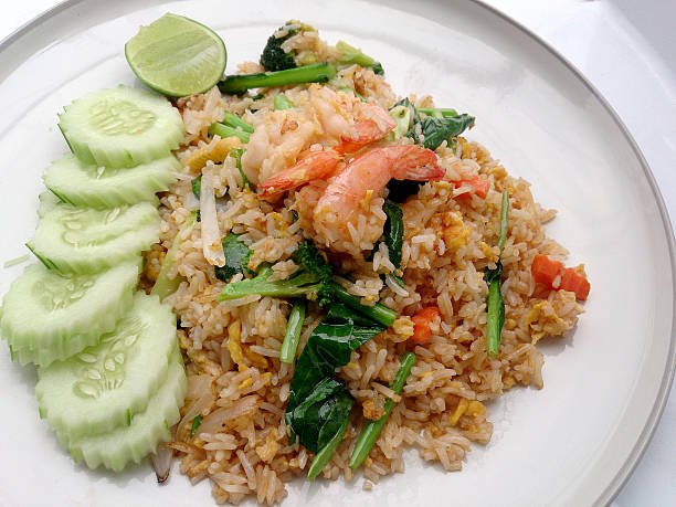 istock Fried rice with shrimp on the white dish 518252086