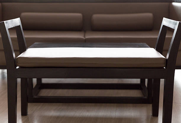 istock wooden sofa with brown leather cushion 518253446