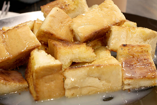 istock Bread toast with butter and condensed milk in 518253632